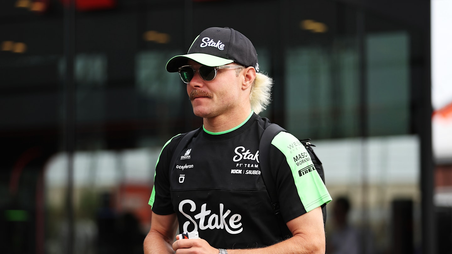 ZANDVOORT, NETHERLANDS - AUGUST 22: Valtteri Bottas of Finland and Stake F1 Team Kick Sauber walks