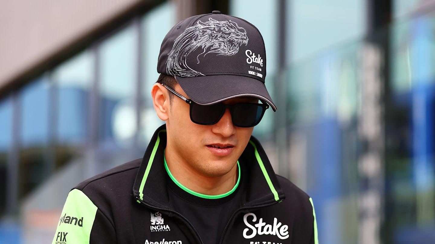 ZANDVOORT, NETHERLANDS - AUGUST 22: Zhou Guanyu of China and Stake F1 Team Kick Sauber walks in the