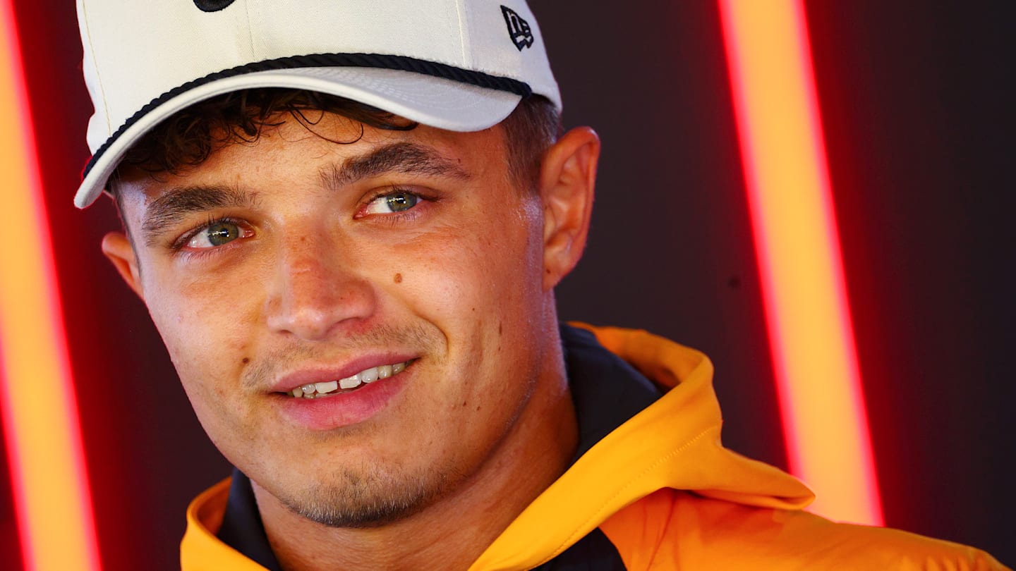 ZANDVOORT, NETHERLANDS - AUGUST 22: Lando Norris of Great Britain and McLaren talks to the media in