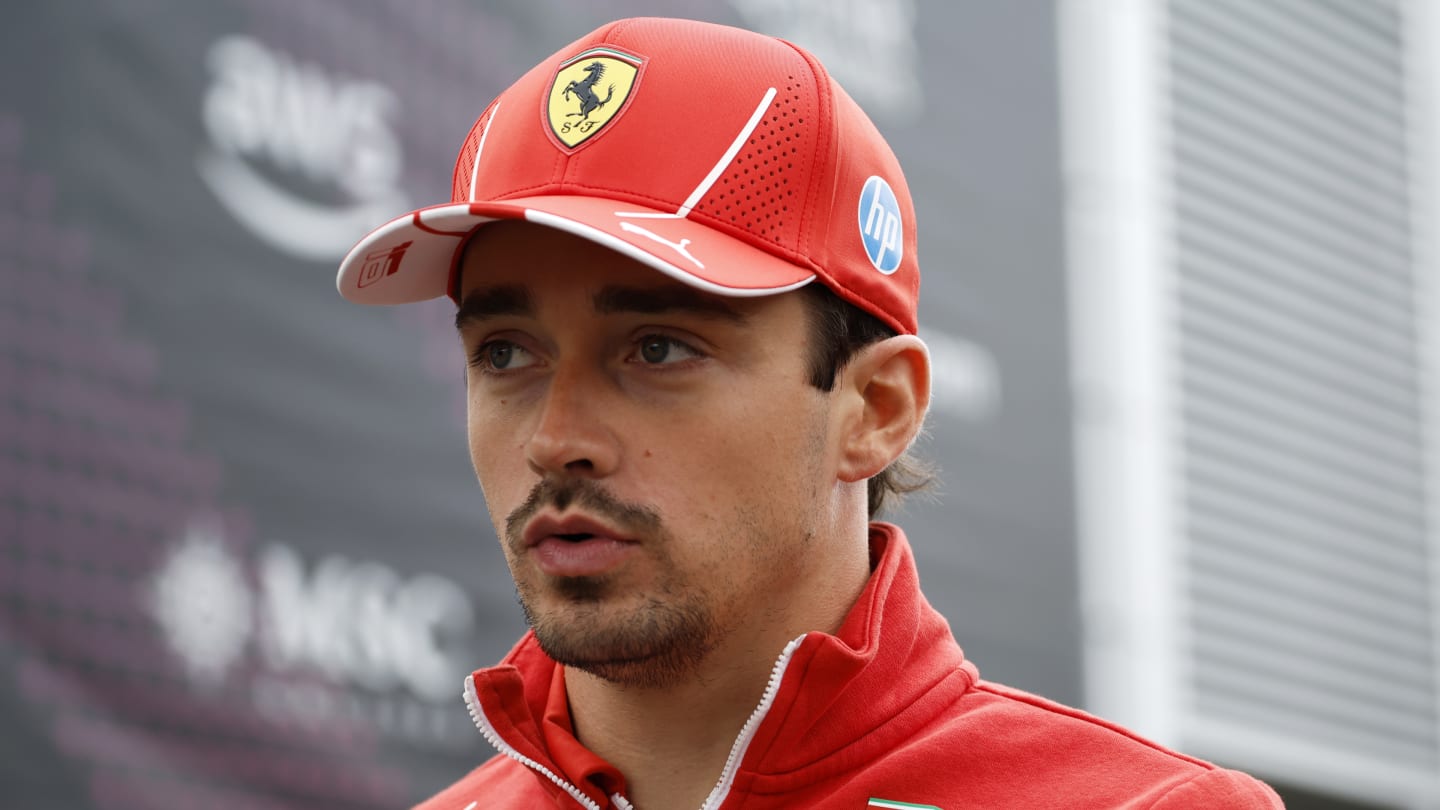 BARCELONA, SPAIN - JUNE 20: Charles Leclerc of Monaco and Ferrari walks in the Paddock during