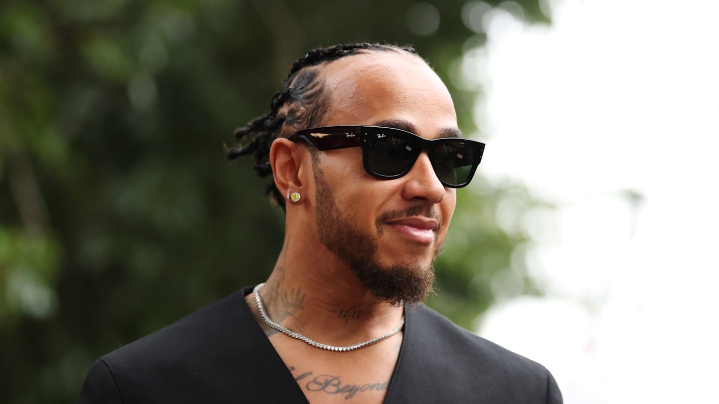 MELBOURNE, AUSTRALIA - MARCH 13: Lewis Hamilton of Great Britain and Scuderia Ferrari looks on in