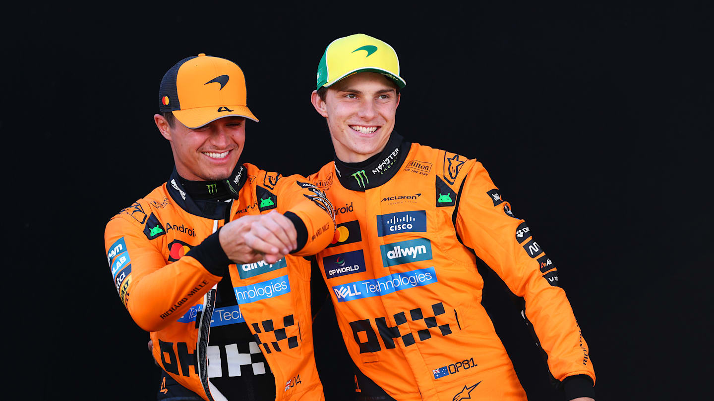 MELBOURNE, AUSTRALIA - MARCH 13: Lando Norris of Great Britain and McLaren and Oscar Piastri of