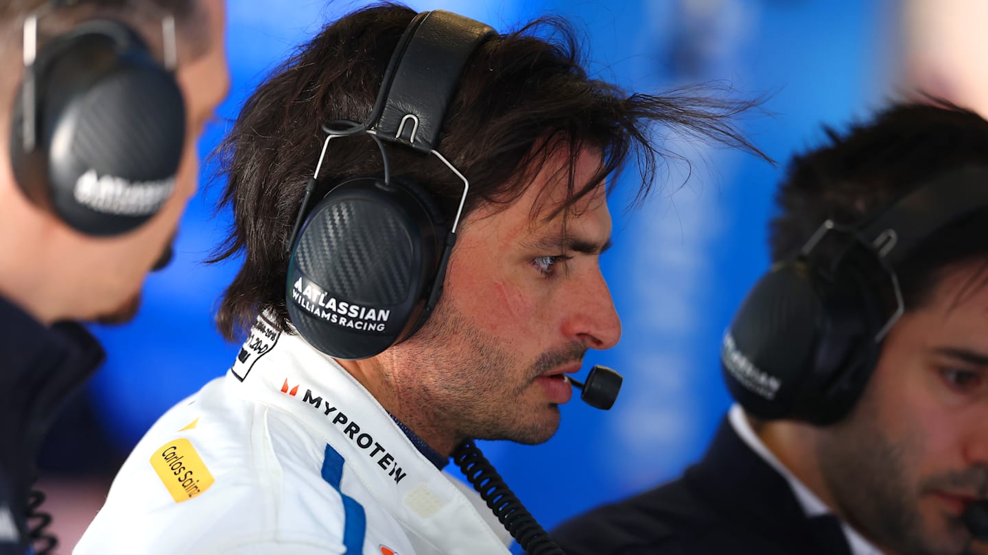 SHANGHAI, CHINA - MARCH 21: Carlos Sainz of Spain and Williams looks on in the garage during