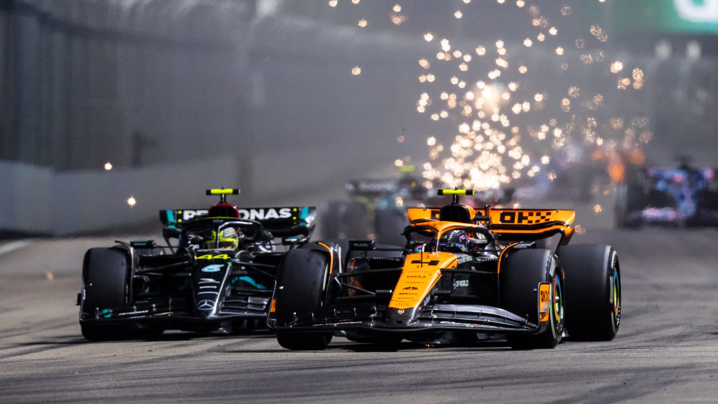 SINGAPORE, SINGAPORE - SEPTEMBER 17: Lewis Hamilton of Great Britain driving the (44) Mercedes AMG