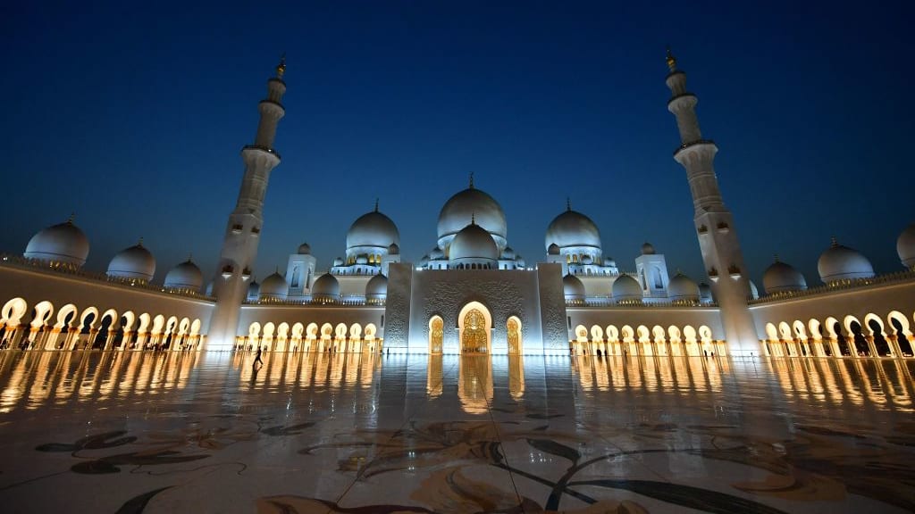 TOPSHOT - A picture taken on December 3, 2017 shows the Sheikh Zayed Grand Mosque in the UAE