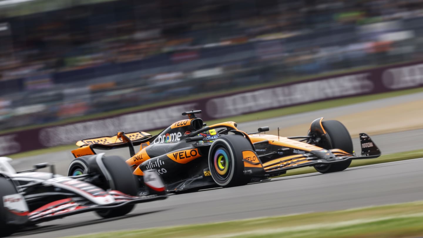 NORTHAMPTON, ENGLAND - JULY 05: Lando Norris of Great Britain and McLaren greets fans as he arrives