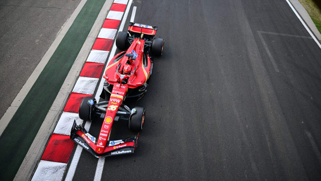 BUDAPEST, HUNGARY - JULY 20: Charles Leclerc of Monaco and Ferrari and Carlos Sainz of Spain and