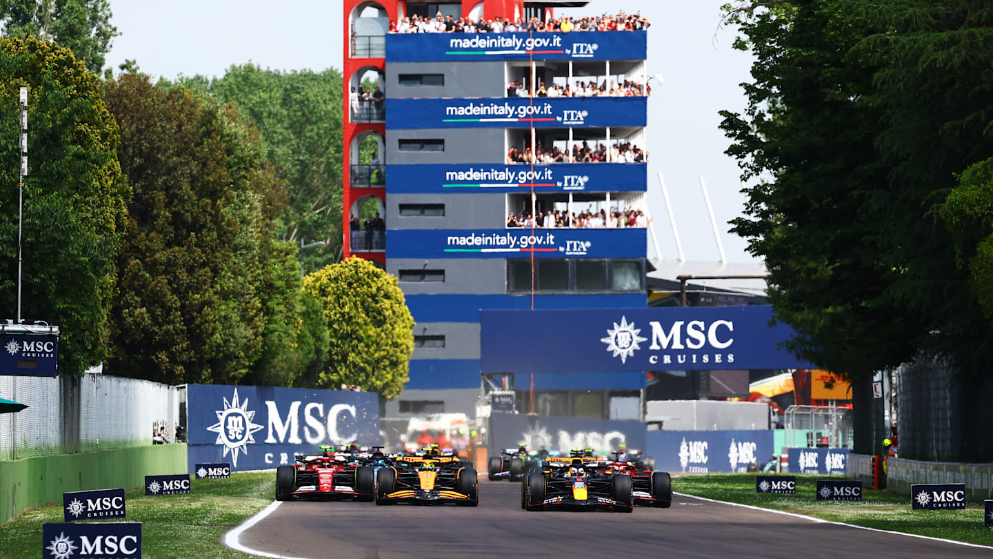 IMOLA, ITALY - MAY 19: Fans show their support as drivers make their way to parc ferme following
