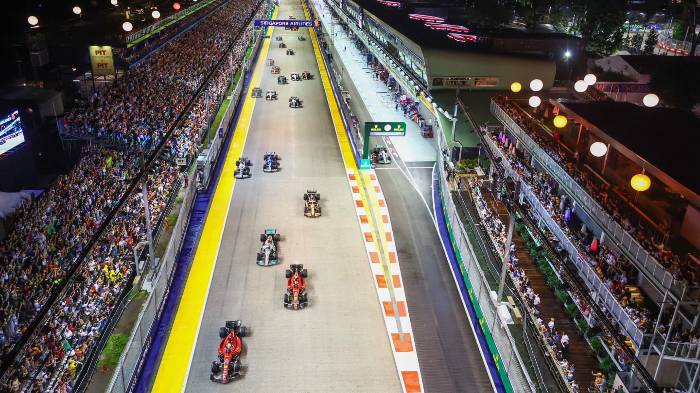 SINGAPORE, SINGAPORE - OCTOBER 02: Charles Leclerc of Monaco driving the (16) Ferrari F1-75 leads