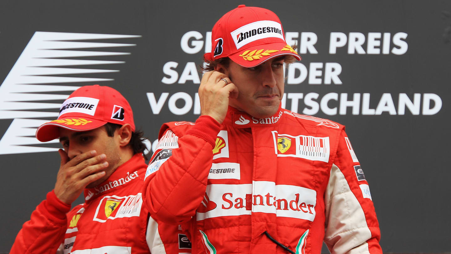 HOCKENHEIM, GERMANY - JULY 25:  Race winner Fernando Alonso (R) of Spain and Ferrari celebrates on