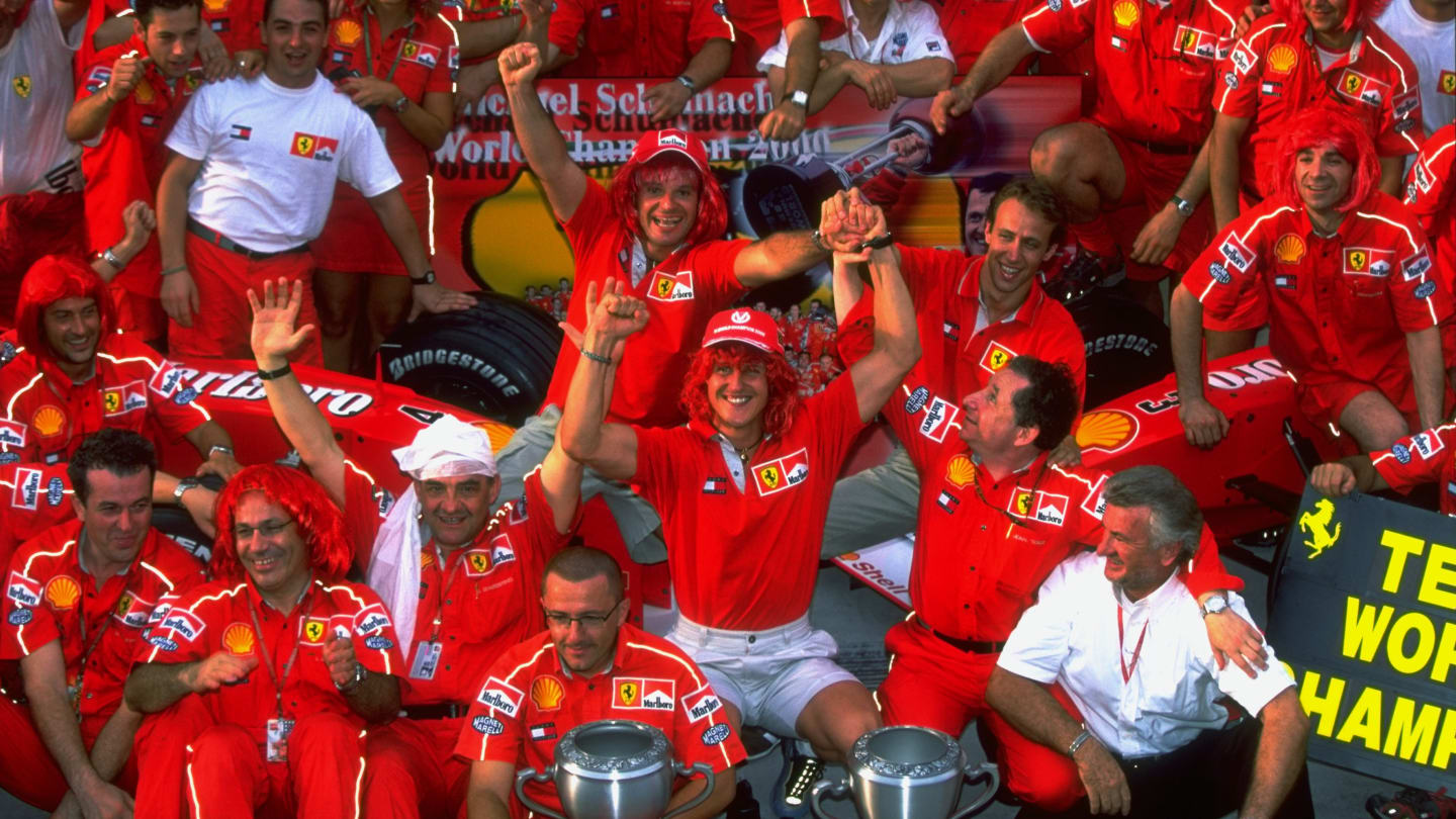 22 Oct 2000:  Michael Schumacher of Germany and Ferrari celebrates winning with the Ferrari team