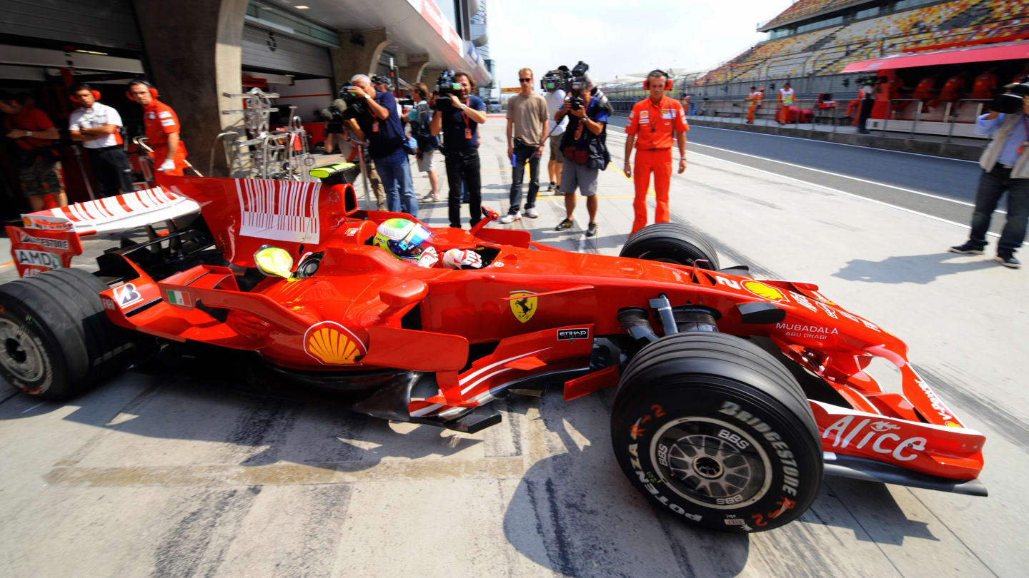 World title-chasing Brazilian Felipe Massa takes his Ferrari out from the pits during the opening