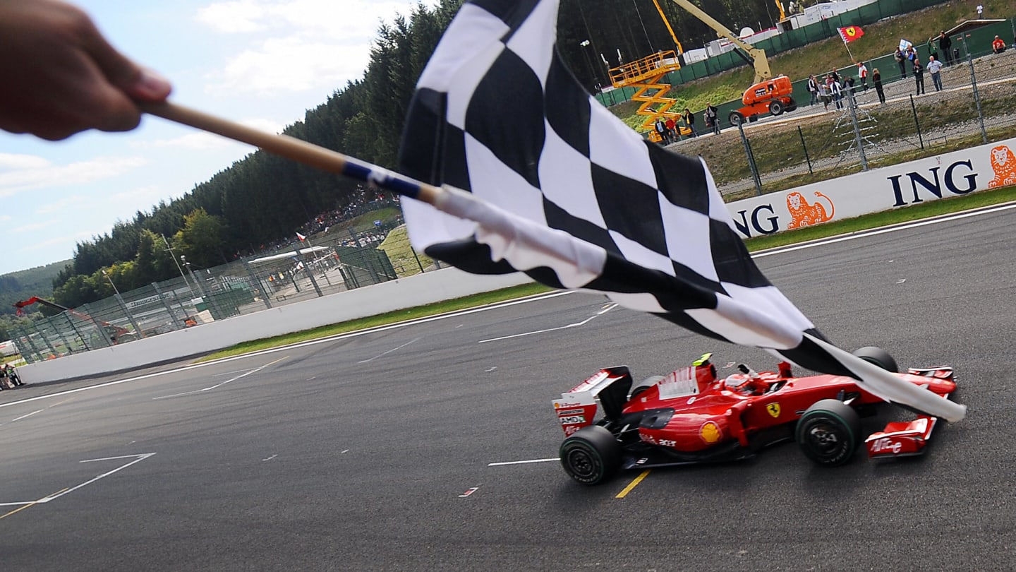 Ferrari's Finnish driver Kimi Raikkonen crosses the finnish line of the Spa-Francorchamps Circuit