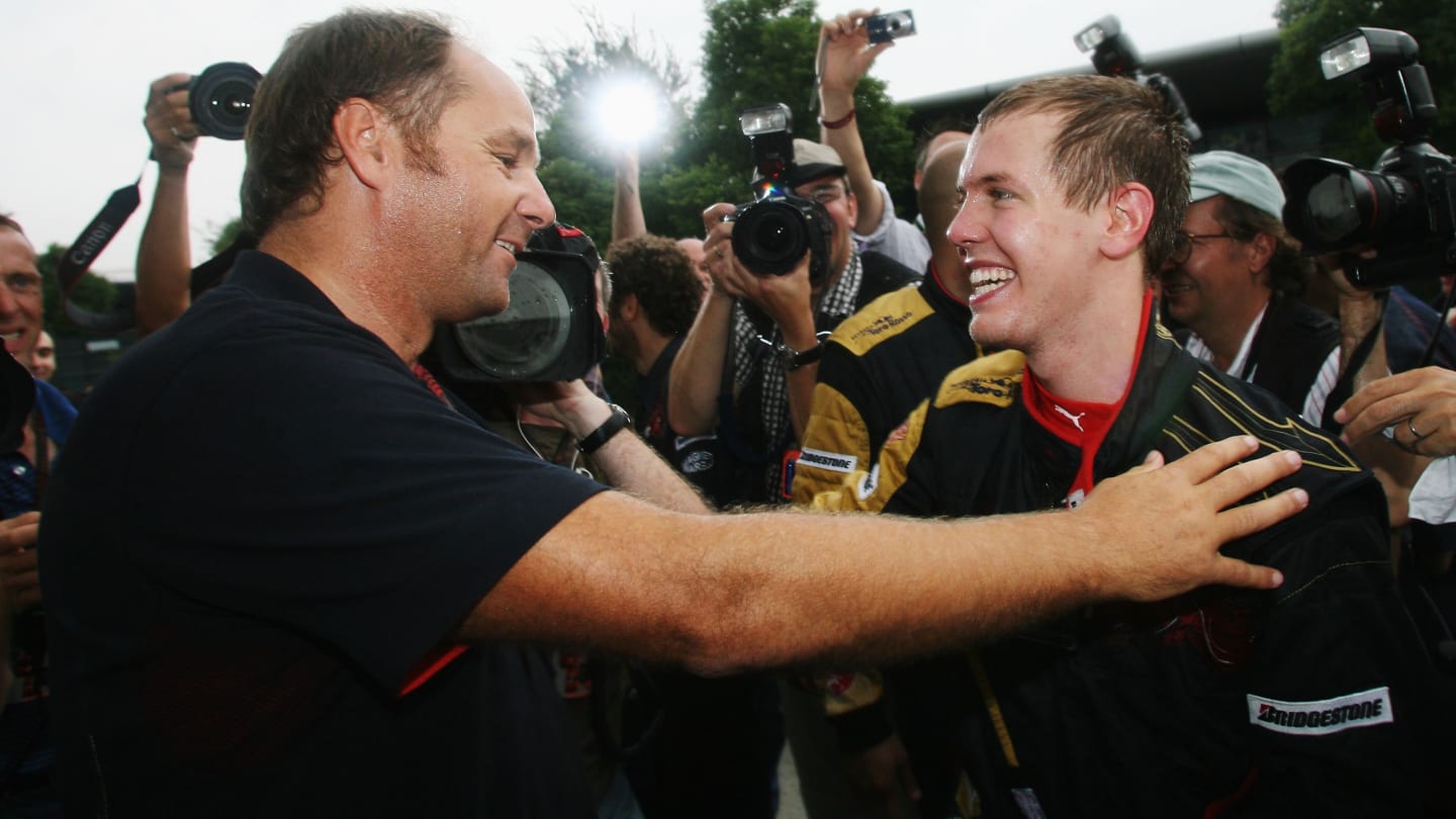 SHANGHAI, CHINA - OCTOBER 07:  Sebastian Vettel (R) of Germany and Scuderia Toro Rosso celebrates