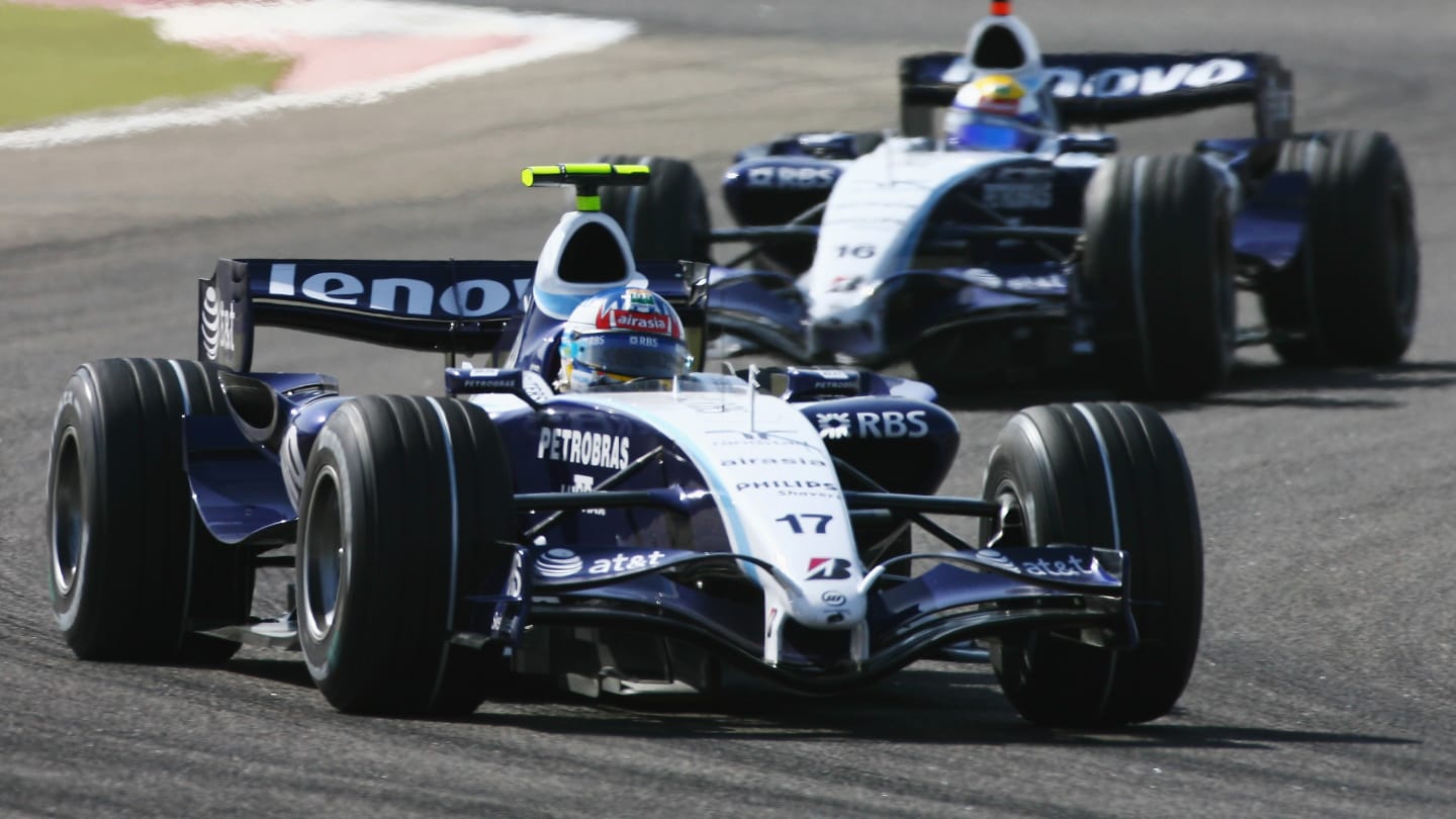 SAKHIR, BAHRAIN - APRIL 15:  Alex Wurz of Austria and Williams leads from his team mate Nico