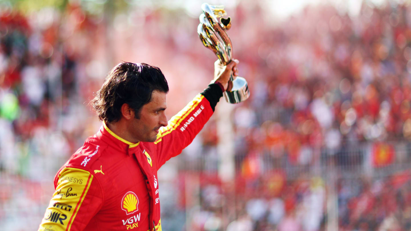 MONZA, ITALY - SEPTEMBER 03: Third placed Carlos Sainz of Spain and Ferrari celebrates on the