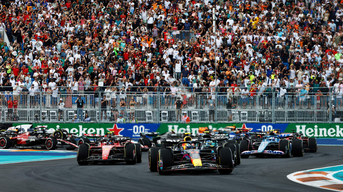 MIAMI, FLORIDA - MAY 07: Sergio Perez of Mexico driving the (11) Oracle Red Bull Racing RB19 leads