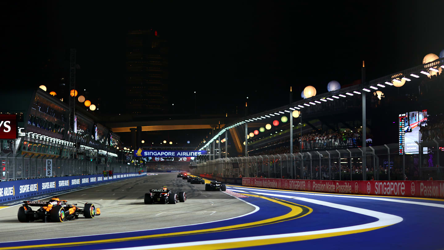 SINGAPORE, SINGAPORE - SEPTEMBER 17: Sergio Perez of Mexico driving the (11) Oracle Red Bull Racing