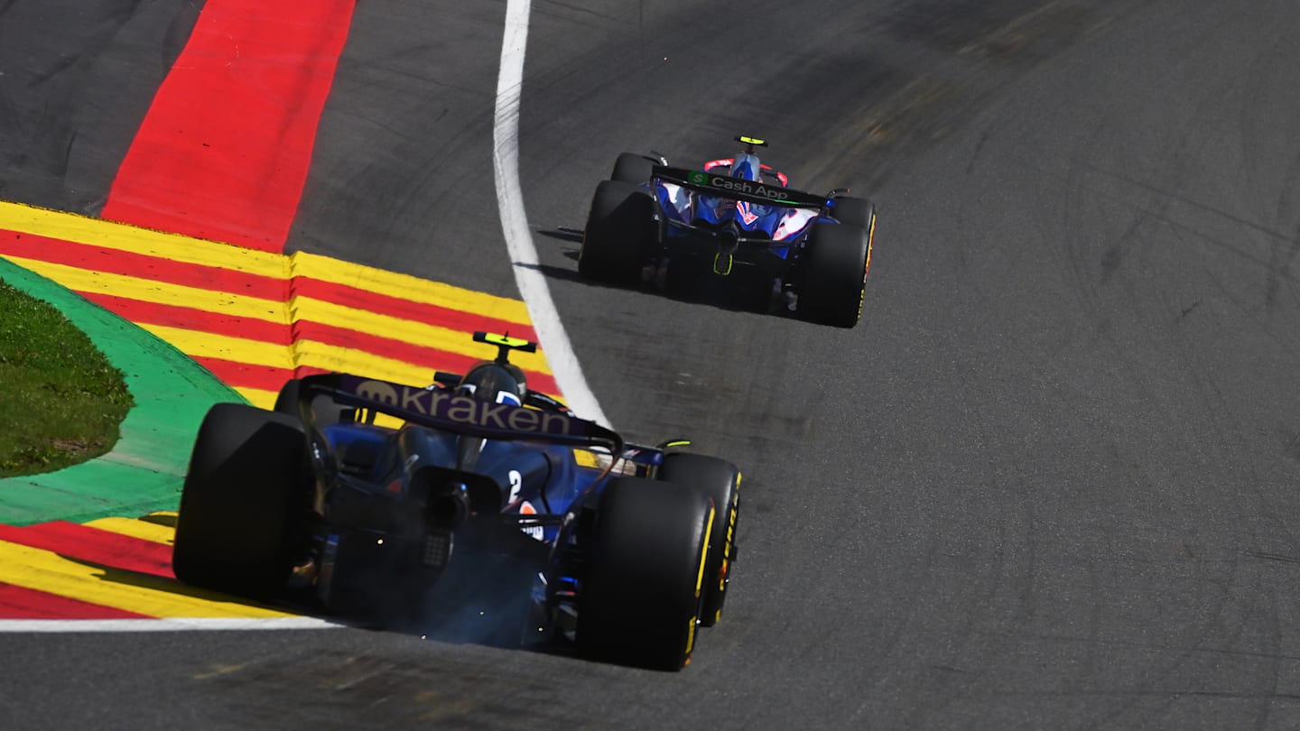 SPA, BELGIUM - JULY 28: Yuki Tsunoda of Japan driving the (22) Visa Cash App RB VCARB 01 leads Logan Sargeant of United States driving the (2) Williams FW46 Mercedes on track during the F1 Grand Prix of Belgium at Circuit de Spa-Francorchamps on July 28, 2024 in Spa, Belgium. (Photo by Rudy Carezzevoli/Getty Images)