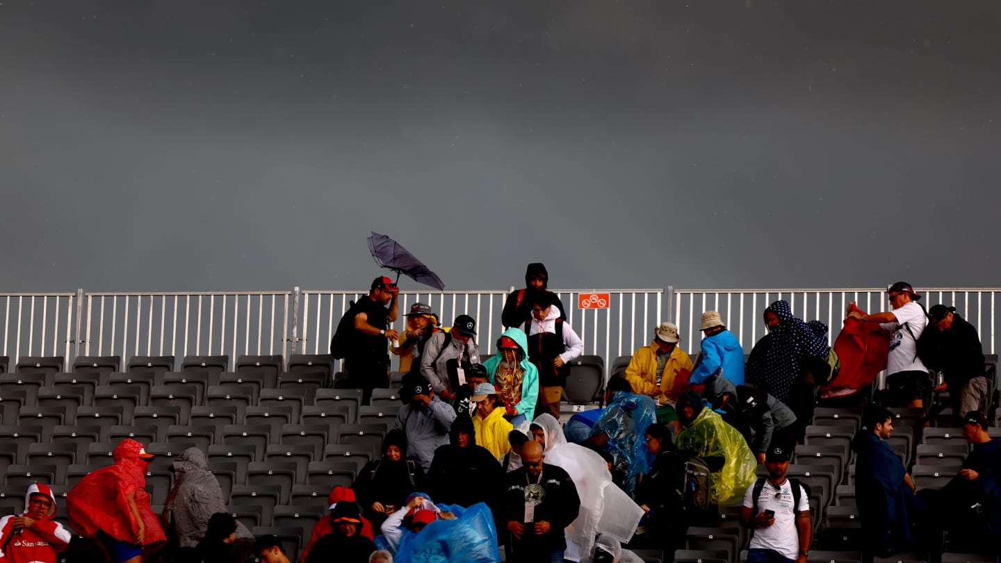 MONTREAL, QUEBEC - JUNE 07: Rain falls over fans in the grandstands prior to practice ahead of the