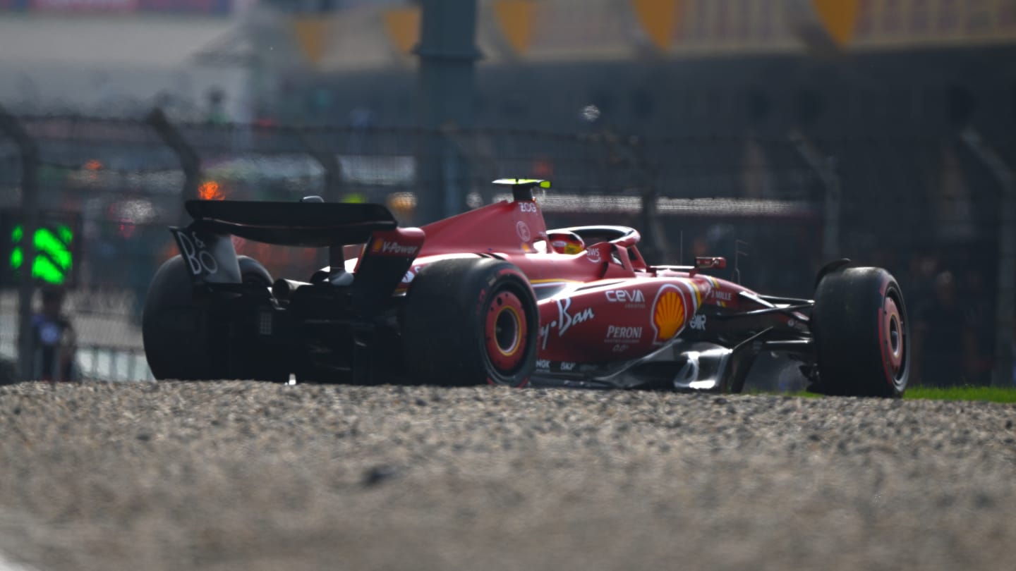 SHANGHAI, CHINA - APRIL 20: Carlos Sainz of Spain and Ferrari in the gravel after crashing his