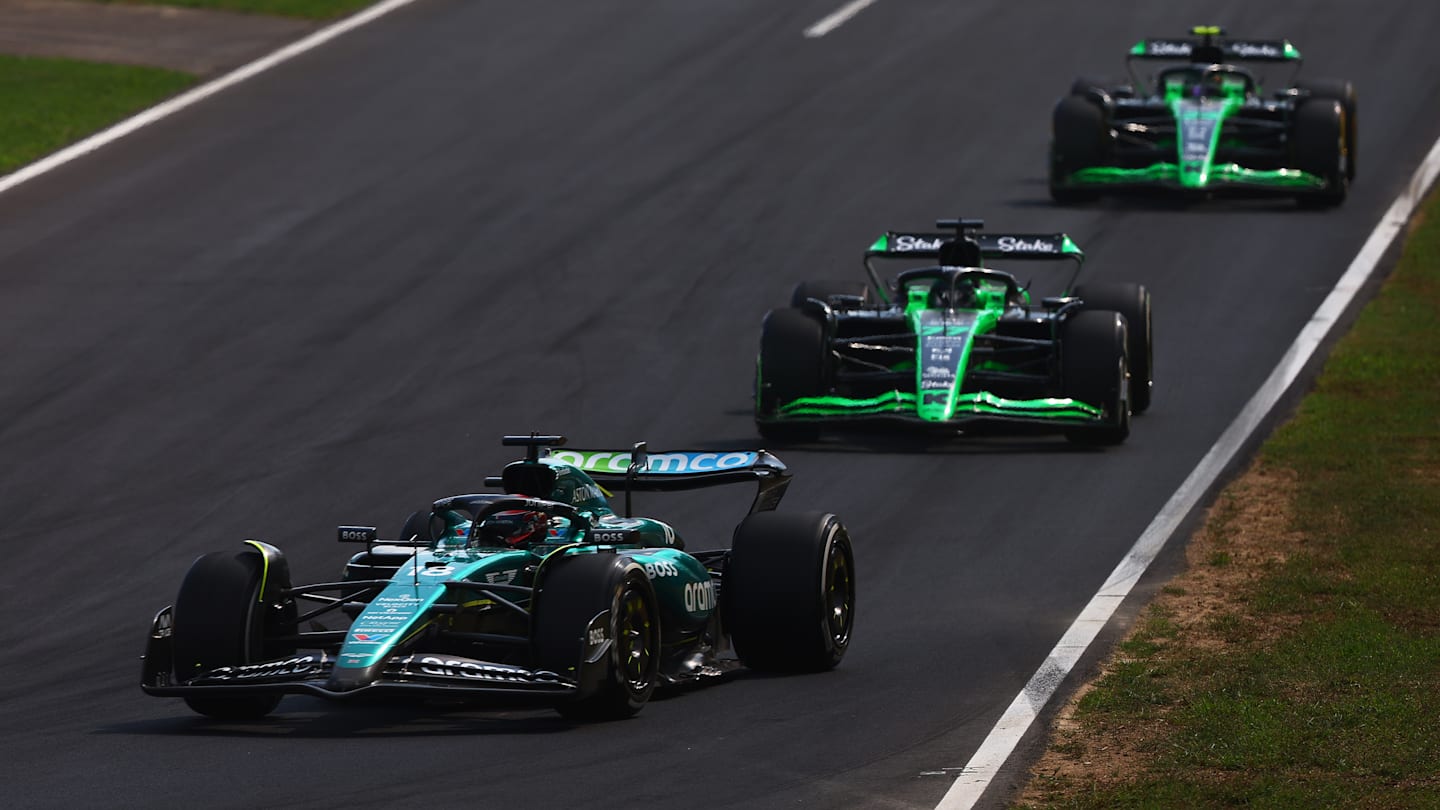 MONZA, ITALY - SEPTEMBER 01: Lance Stroll of Canada driving the (18) Aston Martin AMR24 Mercedes leads Valtteri Bottas of Finland driving the (77) Kick Sauber C44 Ferrari on track during the F1 Grand Prix of Italy at Autodromo Nazionale Monza on September 01, 2024 in Monza, Italy. (Photo by Joe Portlock - Formula 1/Formula 1 via Getty Images)