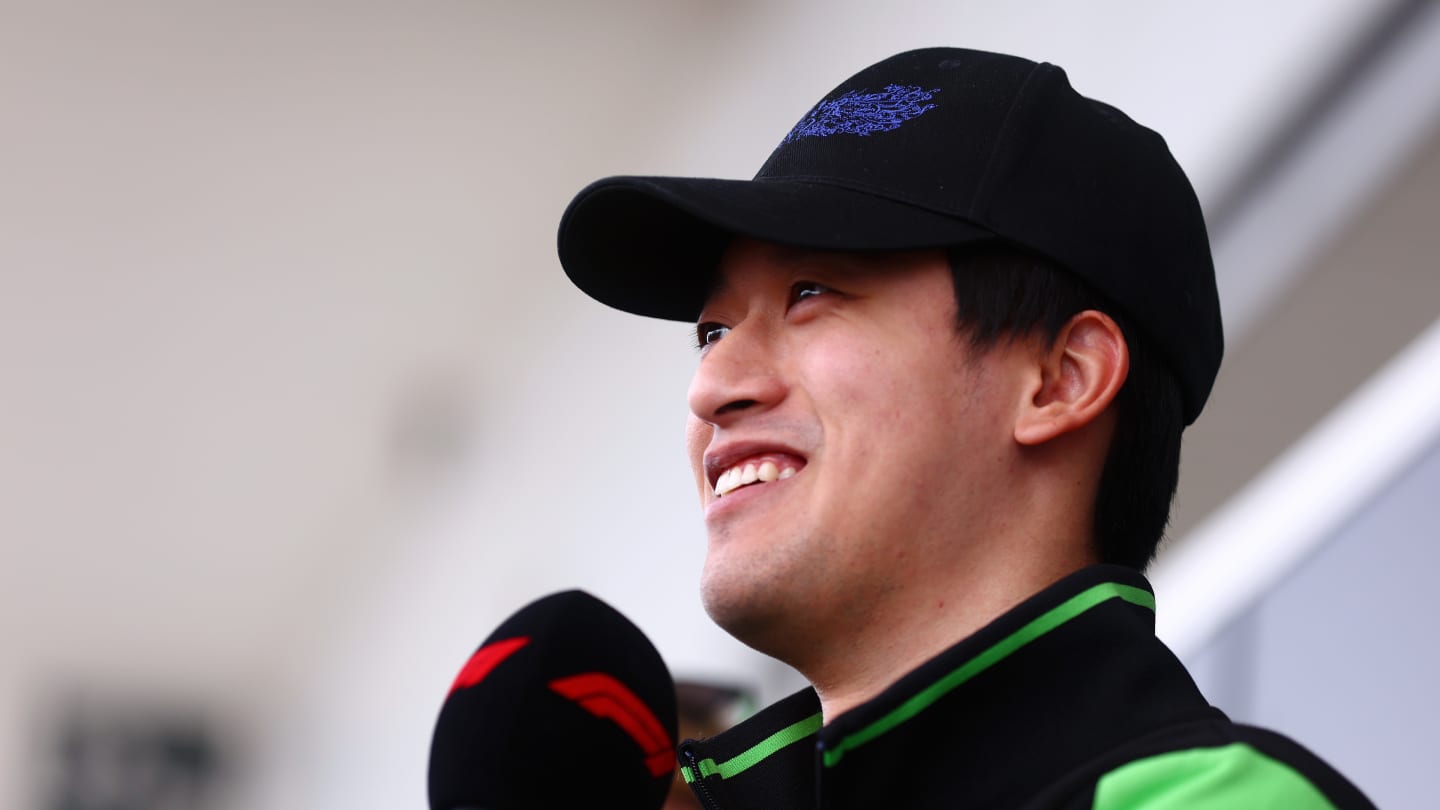 SUZUKA, JAPAN - APRIL 04: Zhou Guanyu of China and Stake F1 Team Kick Sauber talks to the media in