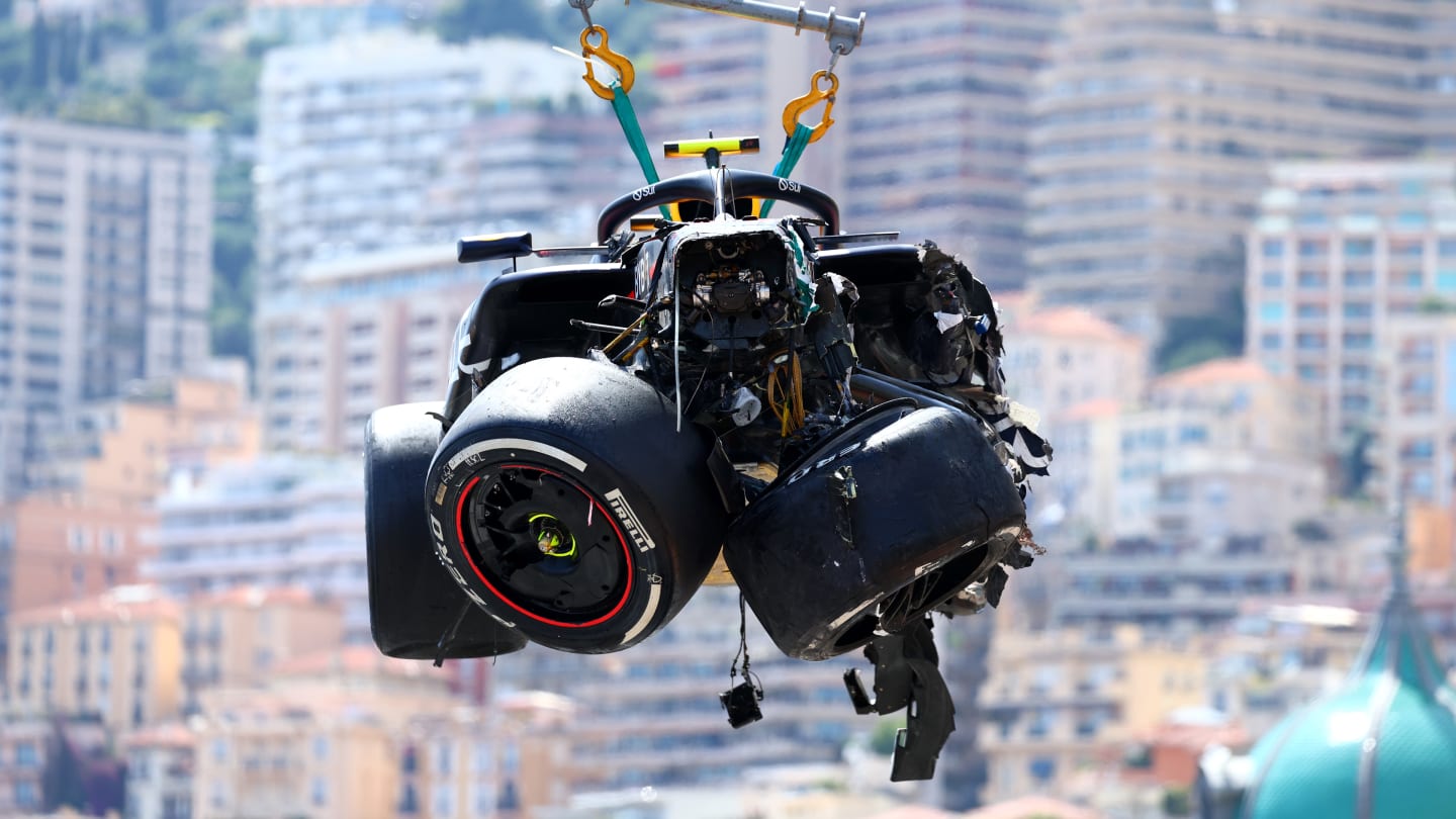 MONTE-CARLO, MONACO - MAY 26: The car of Sergio Perez of Mexico and Oracle Red Bull Racing is recovered from the track after crashing during the F1 Grand Prix of Monaco at Circuit de Monaco on May 26, 2024 in Monte-Carlo, Monaco. (Photo by Clive Rose/Getty Images)