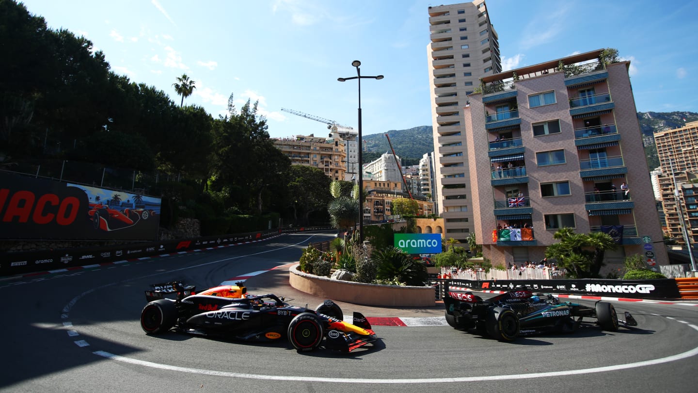 MONTE-CARLO, MONACO - MAY 26: George Russell of Great Britain driving the (63) Mercedes AMG Petronas F1 Team W15 leads Max Verstappen of the Netherlands driving the (1) Oracle Red Bull Racing RB20 on track during the F1 Grand Prix of Monaco at Circuit de Monaco on May 26, 2024 in Monte-Carlo, Monaco. (Photo by Joe Portlock - Formula 1/Formula 1 via Getty Images)