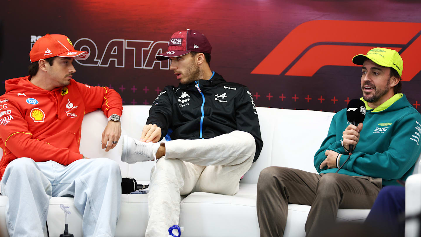 LUSAIL CITY, QATAR - NOVEMBER 28: Charles Leclerc of Monaco and Ferrari, Pierre Gasly of France and