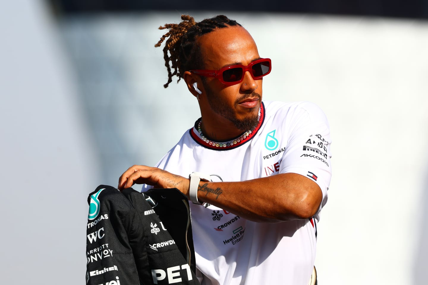ABU DHABI, UNITED ARAB EMIRATES - NOVEMBER 26: Lewis Hamilton of Great Britain and Mercedes looks