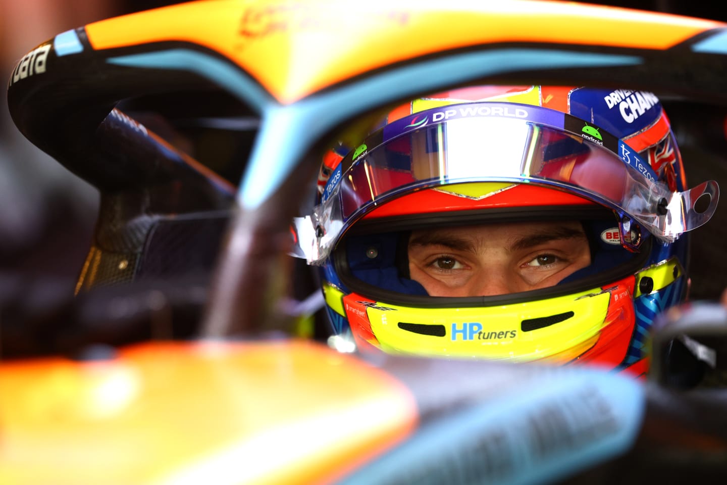 ABU DHABI, UNITED ARAB EMIRATES - NOVEMBER 24: Oscar Piastri of Australia and McLaren prepares to drive in the garage during practice ahead of the F1 Grand Prix of Abu Dhabi at Yas Marina Circuit on November 24, 2023 in Abu Dhabi, United Arab Emirates. (Photo by Clive Rose/Getty Images)