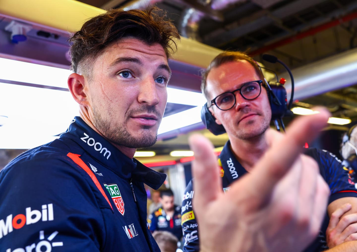 ABU DHABI, UNITED ARAB EMIRATES - NOVEMBER 24: Jake Dennis of Great Britain and Red Bull Racing prepares to drive in the garage during practice ahead of the F1 Grand Prix of Abu Dhabi at Yas Marina Circuit on November 24, 2023 in Abu Dhabi, United Arab Emirates. (Photo by Mark Thompson/Getty Images)