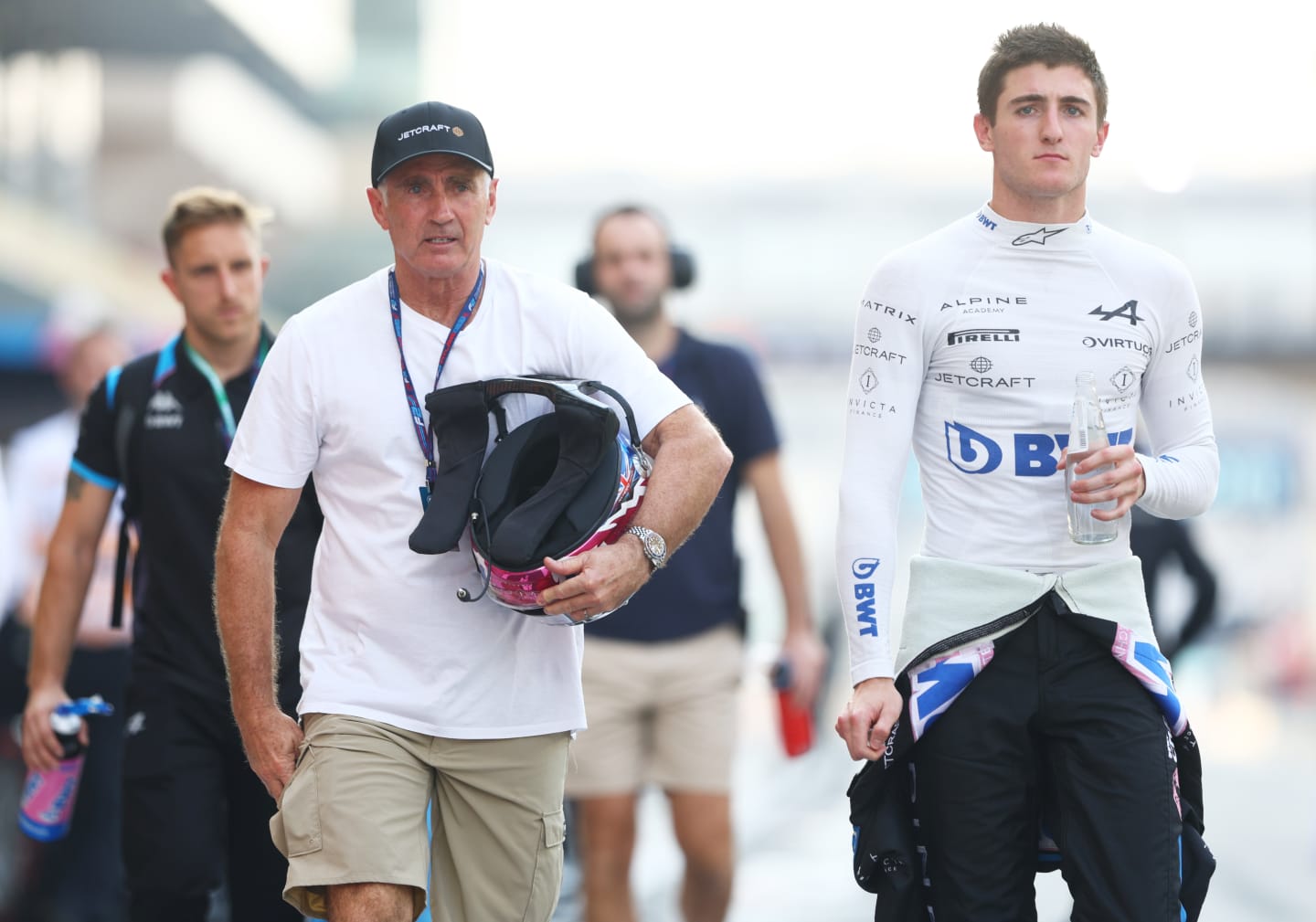 ABU DHABI, UNITED ARAB EMIRATES - NOVEMBER 24: Jack Doohan of Australia and Alpine F1 and Mick Doohan walk in the Pitlane during practice ahead of the F1 Grand Prix of Abu Dhabi at Yas Marina Circuit on November 24, 2023 in Abu Dhabi, United Arab Emirates. (Photo by Clive Rose/Getty Images)