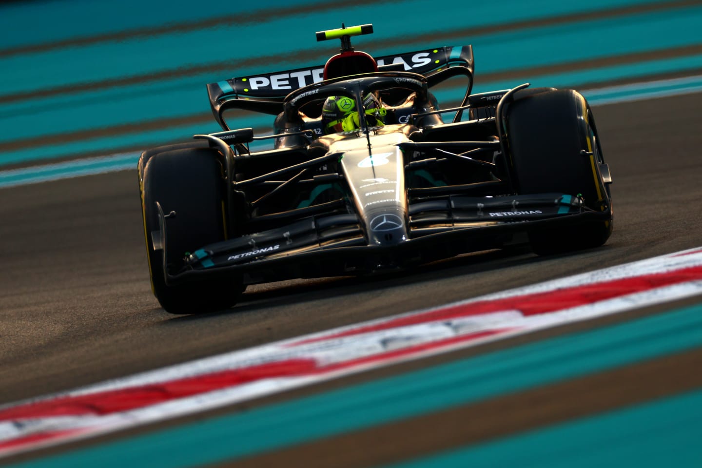 ABU DHABI, UNITED ARAB EMIRATES - NOVEMBER 24: Lewis Hamilton of Great Britain driving the (44)