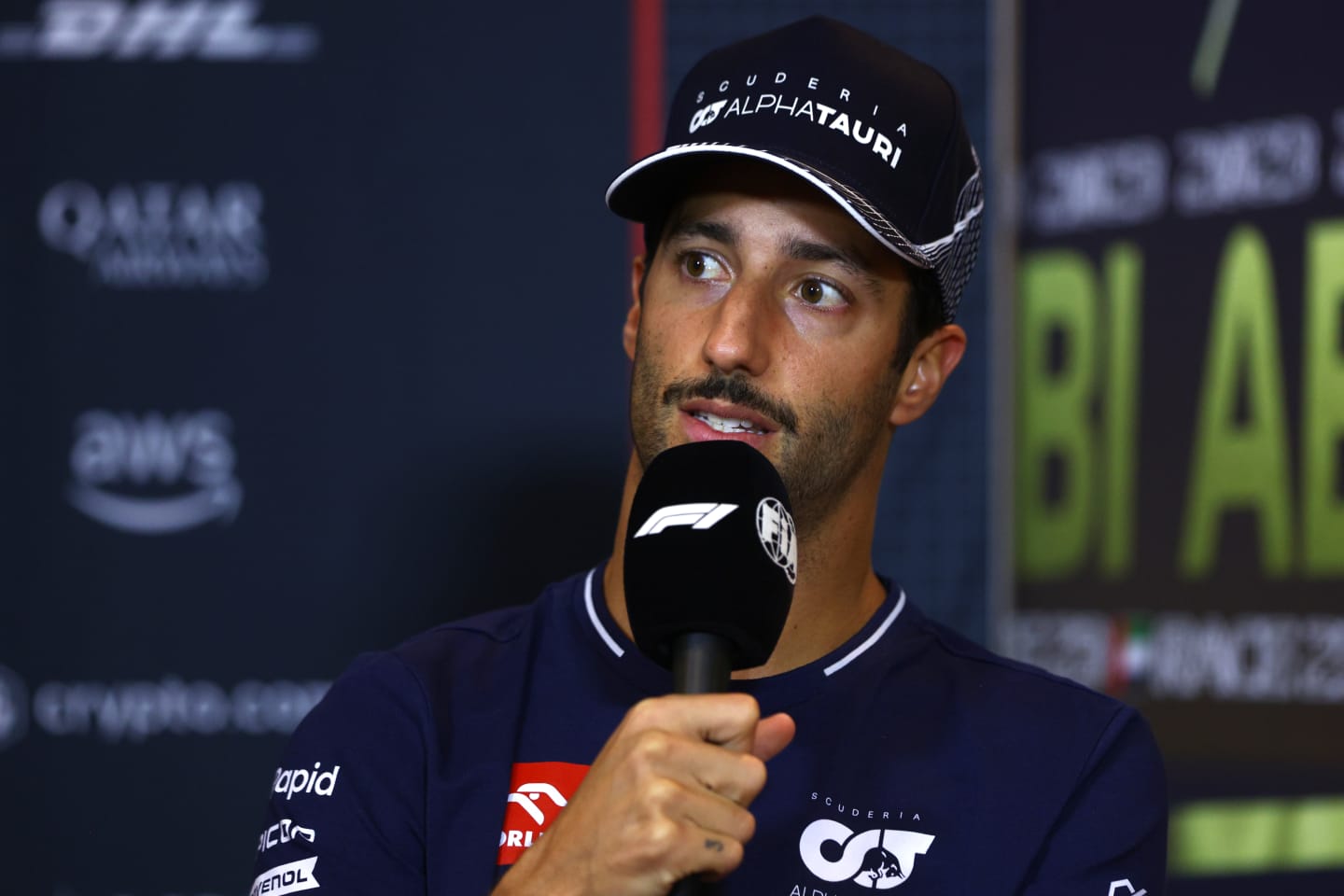 ABU DHABI, UNITED ARAB EMIRATES - NOVEMBER 23: Daniel Ricciardo of Australia and Scuderia AlphaTauri attends the Drivers Press Conference during previews ahead of the F1 Grand Prix of Abu Dhabi at Yas Marina Circuit on November 23, 2023 in Abu Dhabi, United Arab Emirates. (Photo by Clive Rose/Getty Images)