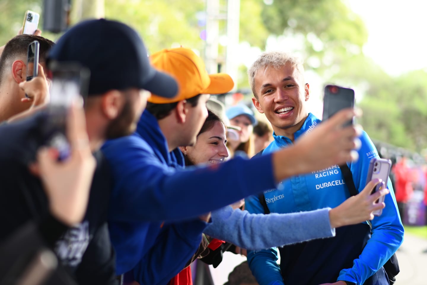 MELBOURNE, AUSTRALIA - MARCH 31: Alexander Albon of Thailand and Williams greets fans on the Melbourne Walk prior to practice ahead of the F1 Grand Prix of Australia at Albert Park Grand Prix Circuit on March 31, 2023 in Melbourne, Australia. (Photo by Quinn Rooney/Getty Images)
