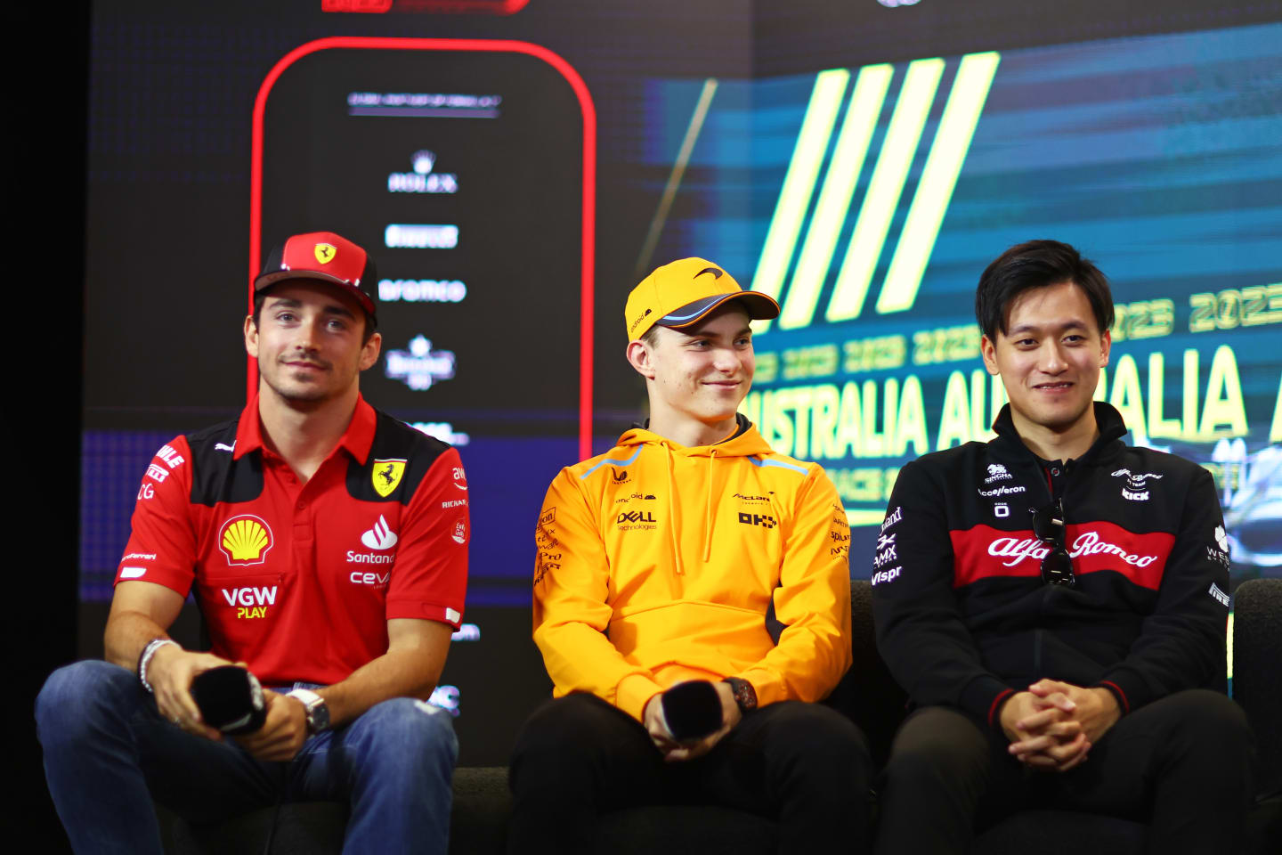 MELBOURNE, AUSTRALIA - MARCH 30: Charles Leclerc of Monaco and Ferrari, Lando Norris of Great Britain and McLaren and Zhou Guanyu of China and Alfa Romeo F1 attend the Drivers Press Conference during previews ahead of the F1 Grand Prix of Australia at Albert Park Grand Prix Circuit on March 30, 2023 in Melbourne, Australia. (Photo by Dan Istitene/Getty Images)