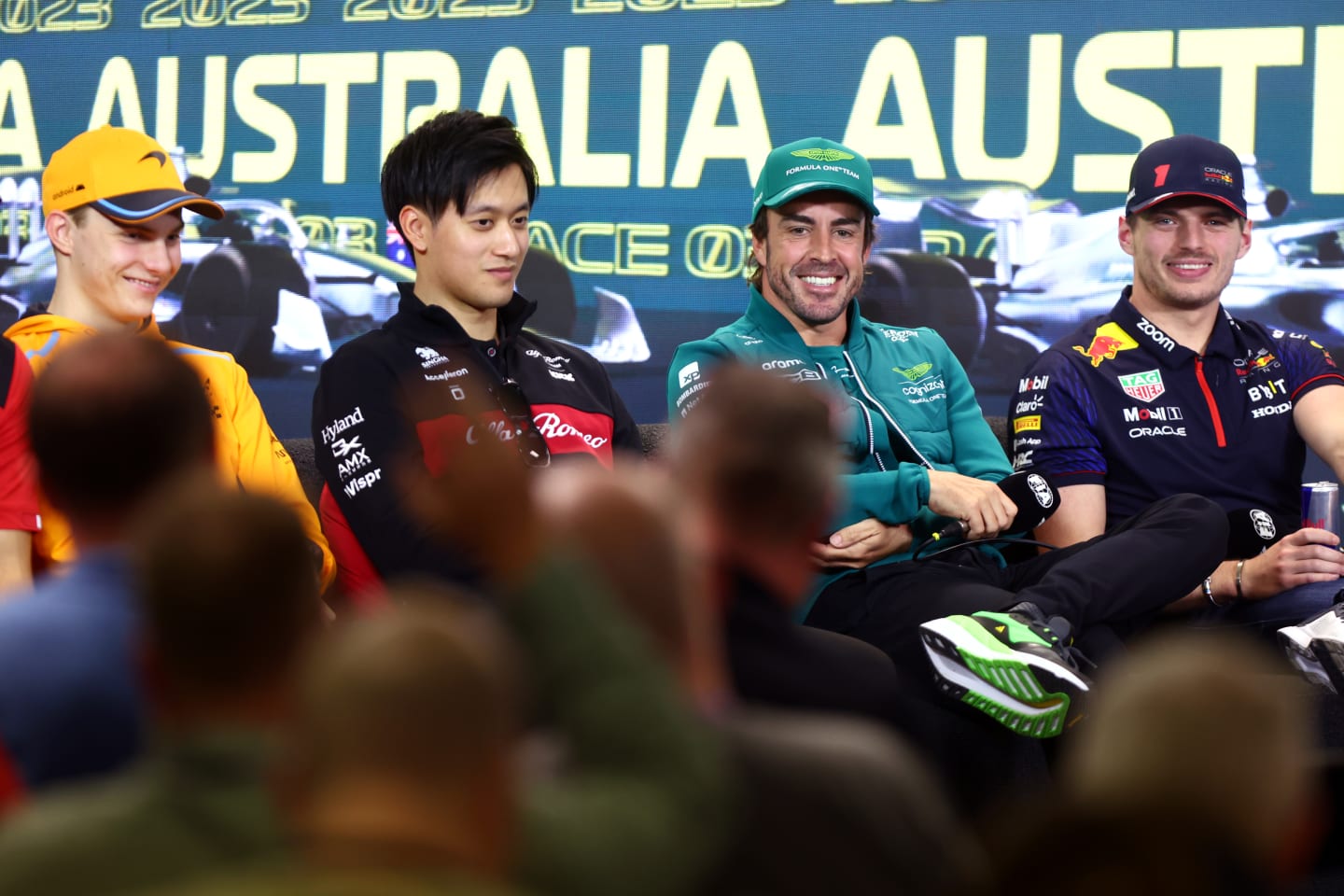 MELBOURNE, AUSTRALIA - MARCH 30: Fernando Alonso of Spain and Aston Martin F1 Team looks on in the Drivers Press Conference with Oscar Piastri of Australia and McLaren, Zhou Guanyu of China and Alfa Romeo F1 and Max Verstappen of the Netherlands and Oracle Red Bull Racing during previews ahead of the F1 Grand Prix of Australia at Albert Park Grand Prix Circuit on March 30, 2023 in Melbourne, Australia. (Photo by Dan Istitene/Getty Images)