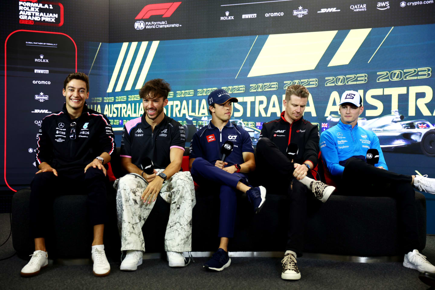 MELBOURNE, AUSTRALIA - MARCH 30: George Russell of Great Britain and Mercedes, Pierre Gasly of France and Alpine F1, Nyck de Vries of Netherlands and Scuderia AlphaTauri, Nico Hulkenberg of Germany and Haas F1 and Logan Sargeant of United States and Williams attend the Drivers Press Conference during previews ahead of the F1 Grand Prix of Australia at Albert Park Grand Prix Circuit on March 30, 2023 in Melbourne, Australia. (Photo by Dan Istitene/Getty Images)
