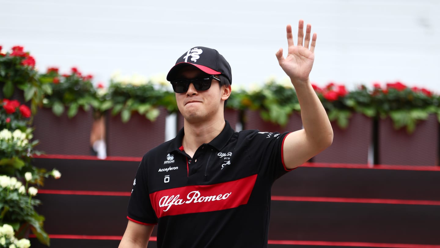 SPIELBERG, AUSTRIA - JULY 02: Zhou Guanyu of China and Alfa Romeo F1 waves to the crowd on the