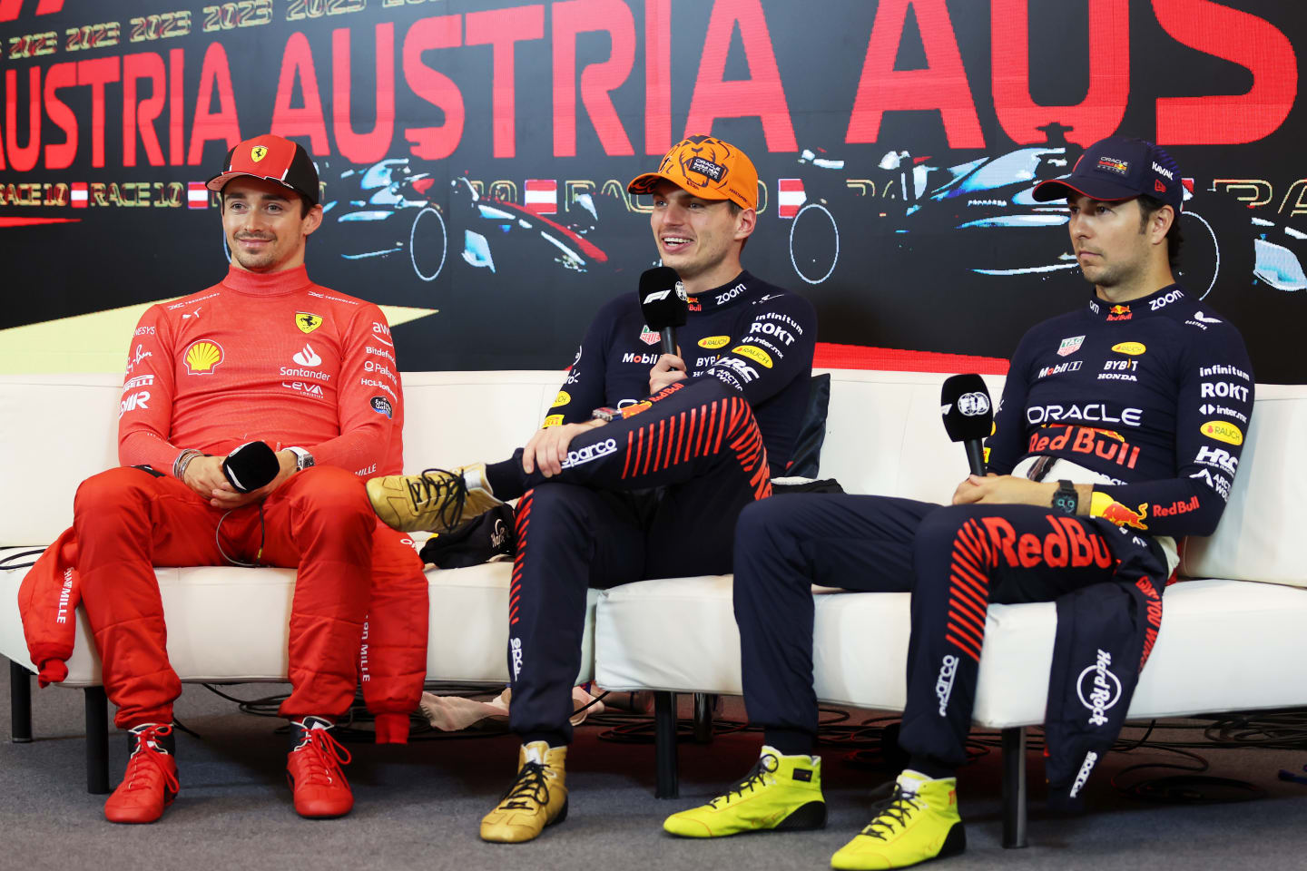 SPIELBERG, AUSTRIA - JULY 02: (L-R) Second placed Charles Leclerc of Monaco and Ferrari, Race