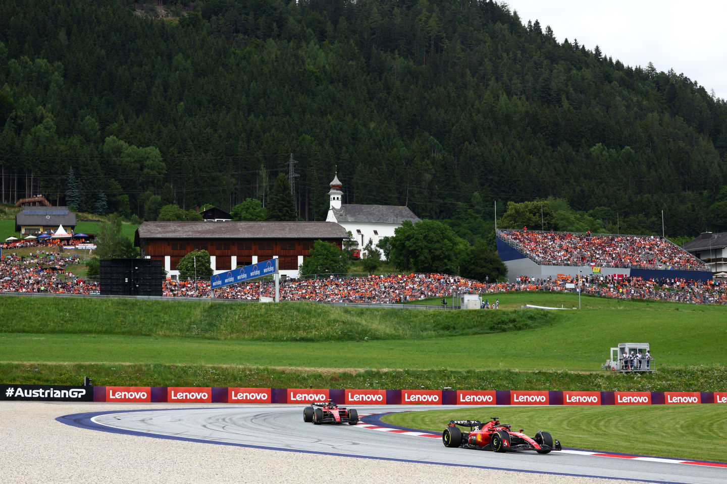 SPIELBERG, AUSTRIA - JULY 02: Charles Leclerc of Monaco driving the (16) Ferrari SF-23 leads Carlos