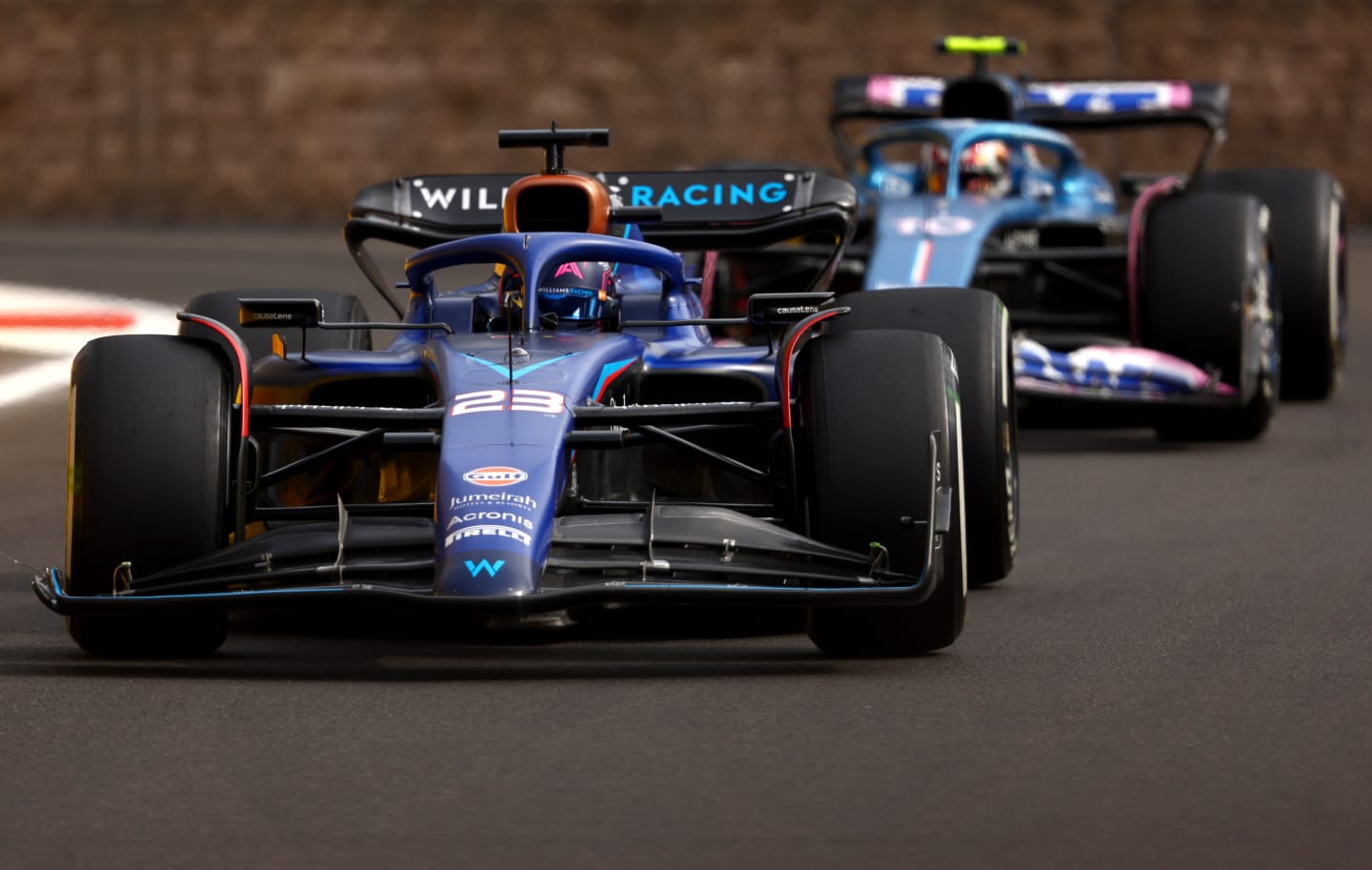 BAKU, AZERBAIJAN - APRIL 30: Alexander Albon of Thailand driving the (23) Williams FW45 Mercedes leads Pierre Gasly of France driving the (10) Alpine F1 A523 Renault on track during the F1 Grand Prix of Azerbaijan at Baku City Circuit on April 30, 2023 in Baku, Azerbaijan. (Photo by Francois Nel/Getty Images)