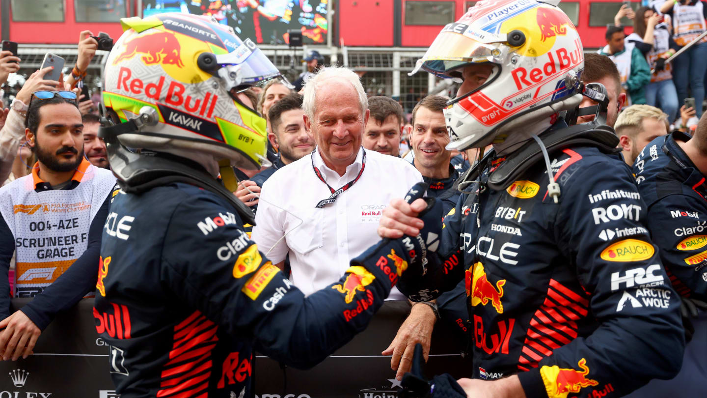 BAKU, AZERBAIJAN - APRIL 30: Race winner Sergio Perez of Mexico and Oracle Red Bull Racing and Second placed Max Verstappen of the Netherlands and Oracle Red Bull Racing celebrate  with Red Bull Racing Team Consultant Dr Helmut Marko in parc ferme during the F1 Grand Prix of Azerbaijan at Baku City Circuit on April 30, 2023 in Baku, Azerbaijan. (Photo by Bryn Lennon - Formula 1/Formula 1 via Getty Images)