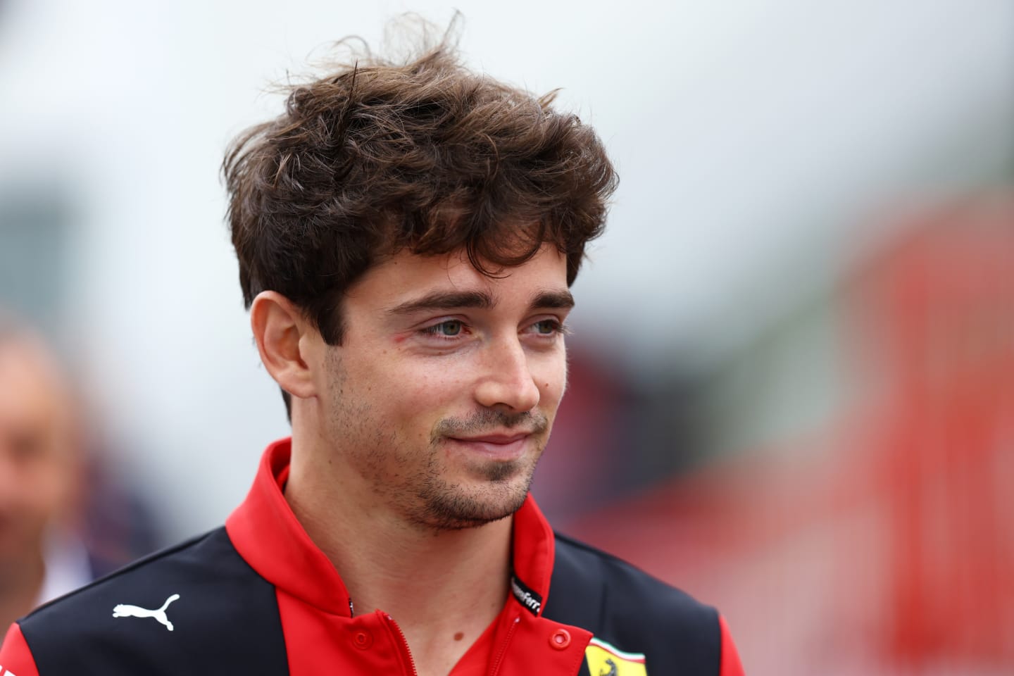 BAKU, AZERBAIJAN - APRIL 28: Charles Leclerc of Monaco and Ferrari looks on in the Paddock prior to