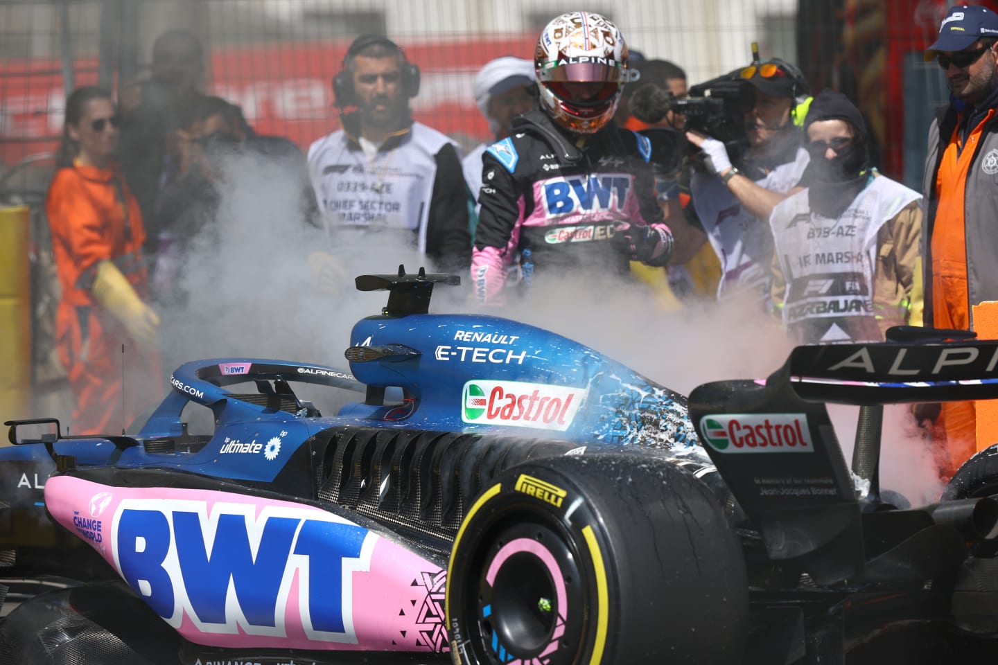BAKU, AZERBAIJAN - APRIL 28: Pierre Gasly of France and Alpine F1 looks on as the fire in his car is put out during practice ahead of the F1 Grand Prix of Azerbaijan at Baku City Circuit on April 28, 2023 in Baku, Azerbaijan. (Photo by Francois Nel/Getty Images)