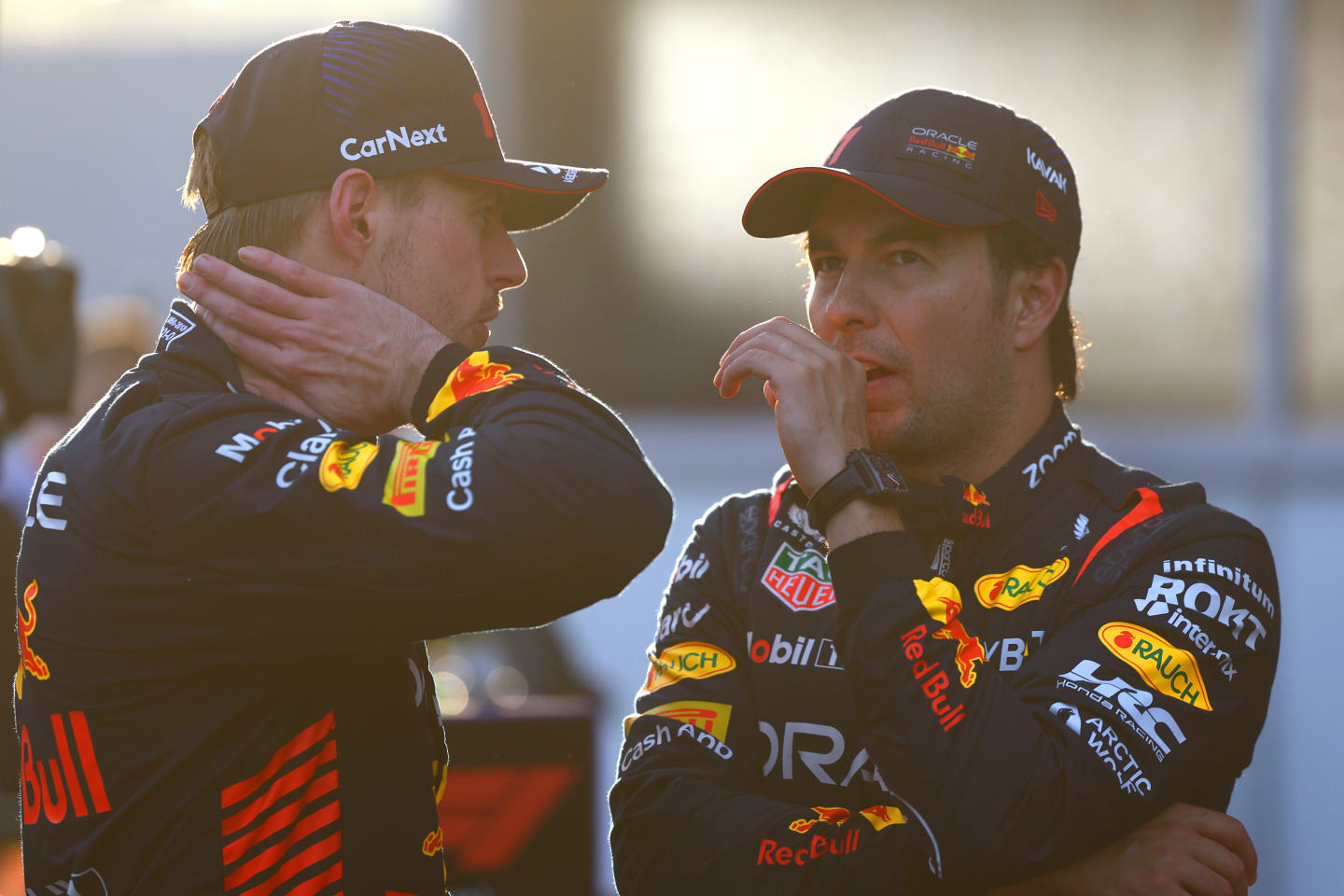 BAKU, AZERBAIJAN - APRIL 28: Second placed qualifier Max Verstappen of the Netherlands and Oracle Red Bull Racing and Third placed qualifier Sergio Perez of Mexico and Oracle Red Bull Racing look on in parc ferme during qualifying ahead of the F1 Grand Prix of Azerbaijan at Baku City Circuit on April 28, 2023 in Baku, Azerbaijan. (Photo by Mark Thompson/Getty Images)