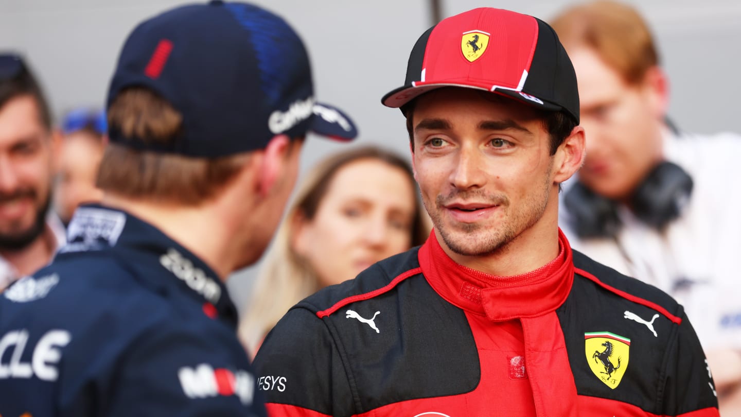 BAKU, AZERBAIJAN - APRIL 28: Pole position qualifier Charles Leclerc of Monaco and Ferrari talks with Second placed qualifier Max Verstappen of the Netherlands and Oracle Red Bull Racing in parc ferme during qualifying ahead of the F1 Grand Prix of Azerbaijan at Baku City Circuit on April 28, 2023 in Baku, Azerbaijan. (Photo by Bryn Lennon - Formula 1/Formula 1 via Getty Images)
