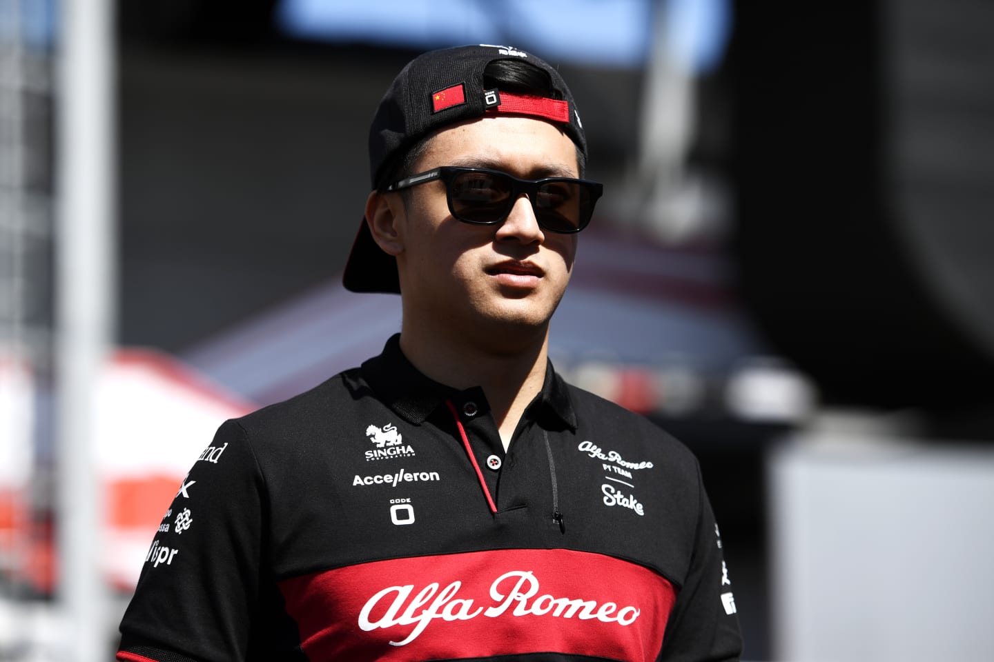 BAKU, AZERBAIJAN - APRIL 27: Zhou Guanyu of China and Alfa Romeo F1 looks on in the Paddock during previews ahead of the F1 Grand Prix of Azerbaijan at Baku City Circuit on April 27, 2023 in Baku, Azerbaijan. (Photo by Rudy Carezzevoli/Getty Images)